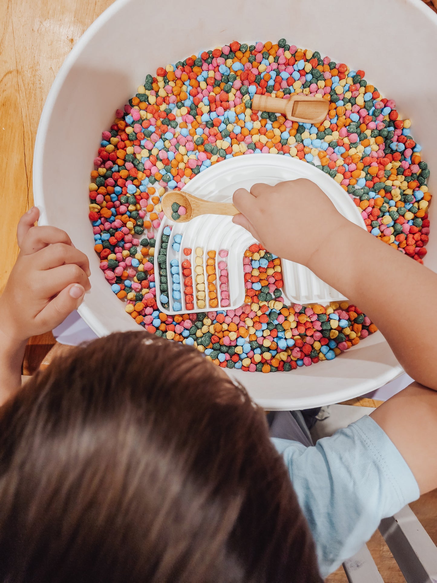 Sensory Rainbow chickpeas - with wooden spoon and scoop