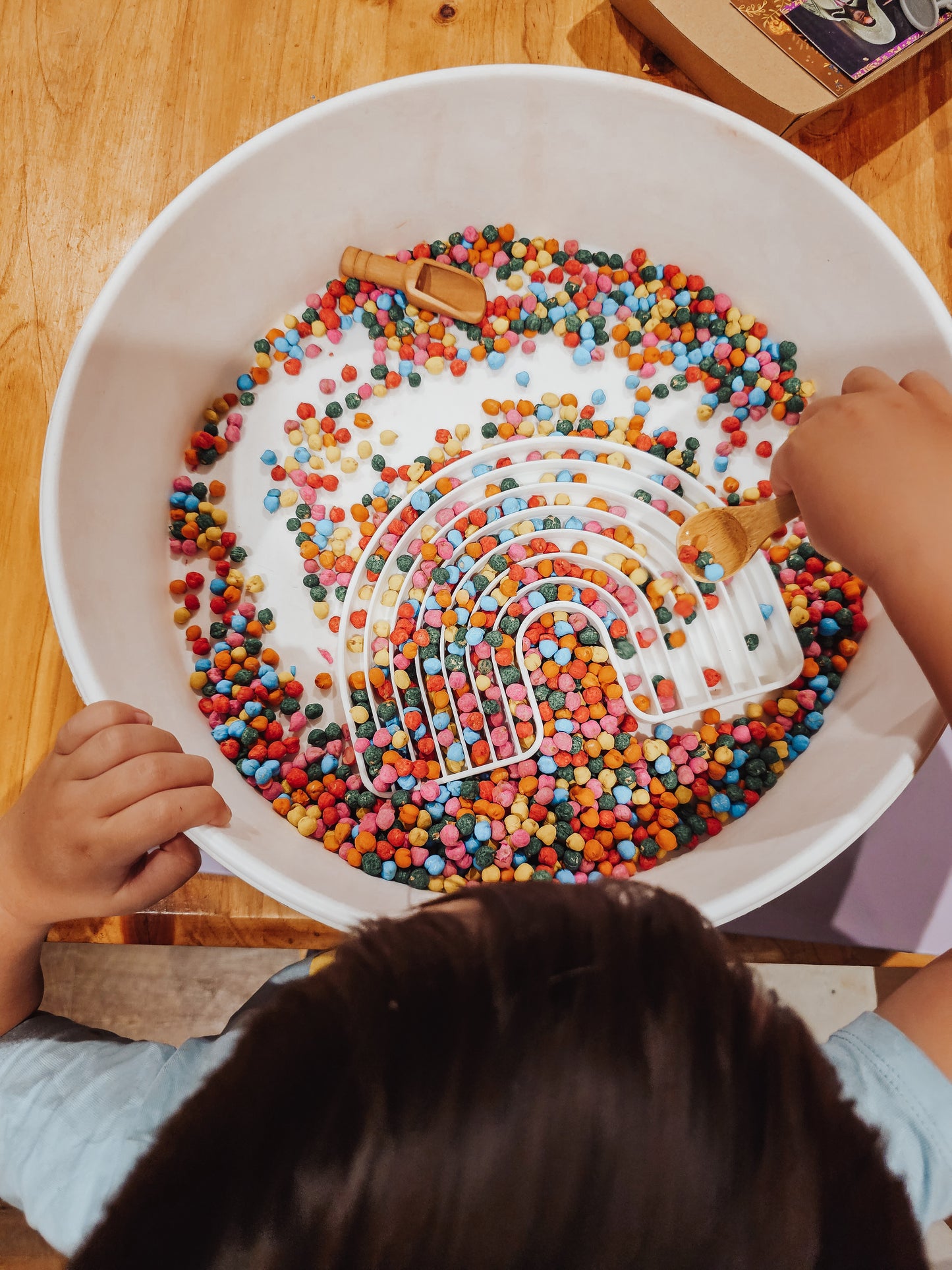 Sensory Rainbow chickpeas - with wooden spoon and scoop